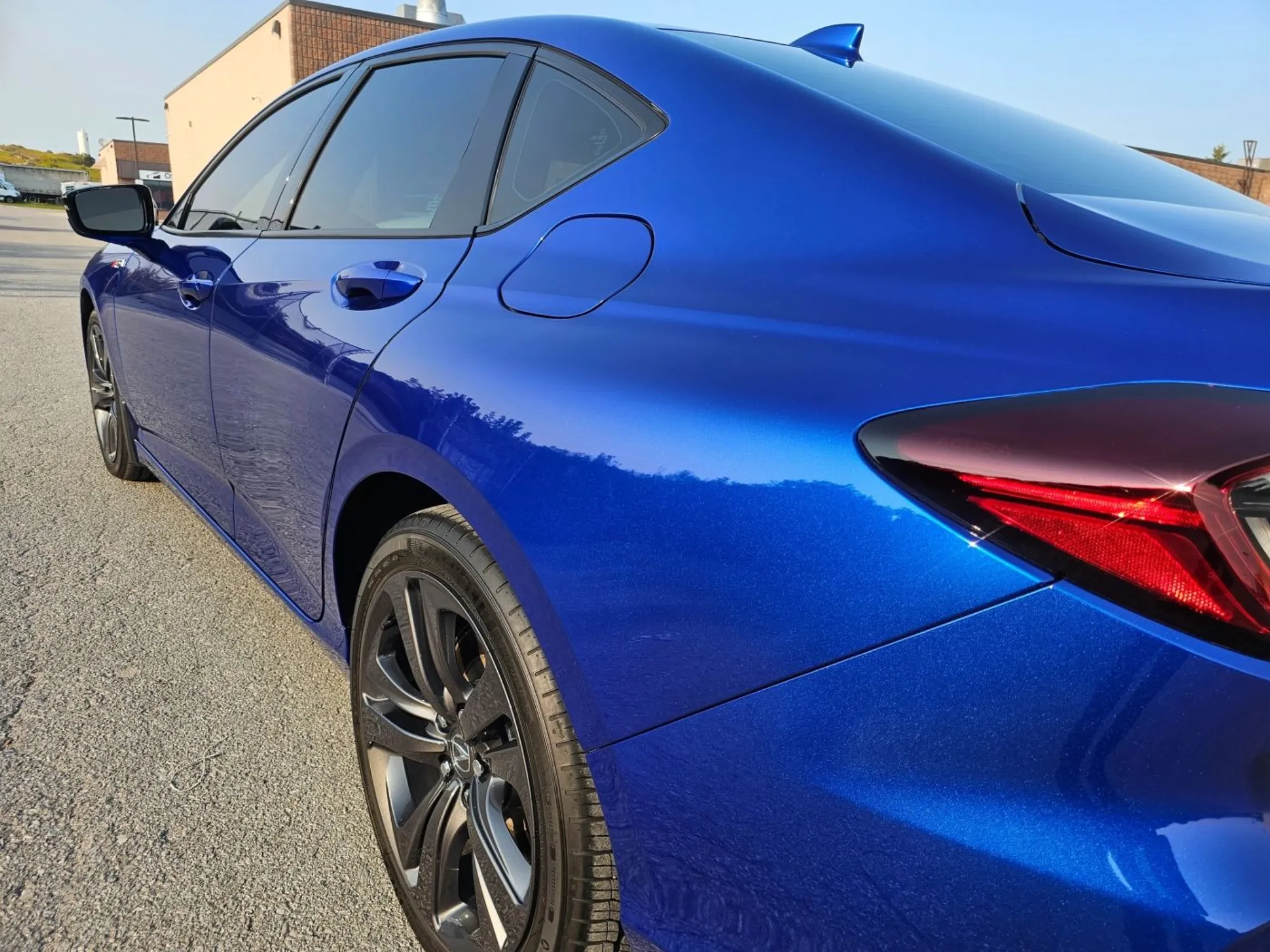 Blue Acura with a high-gloss protected finish