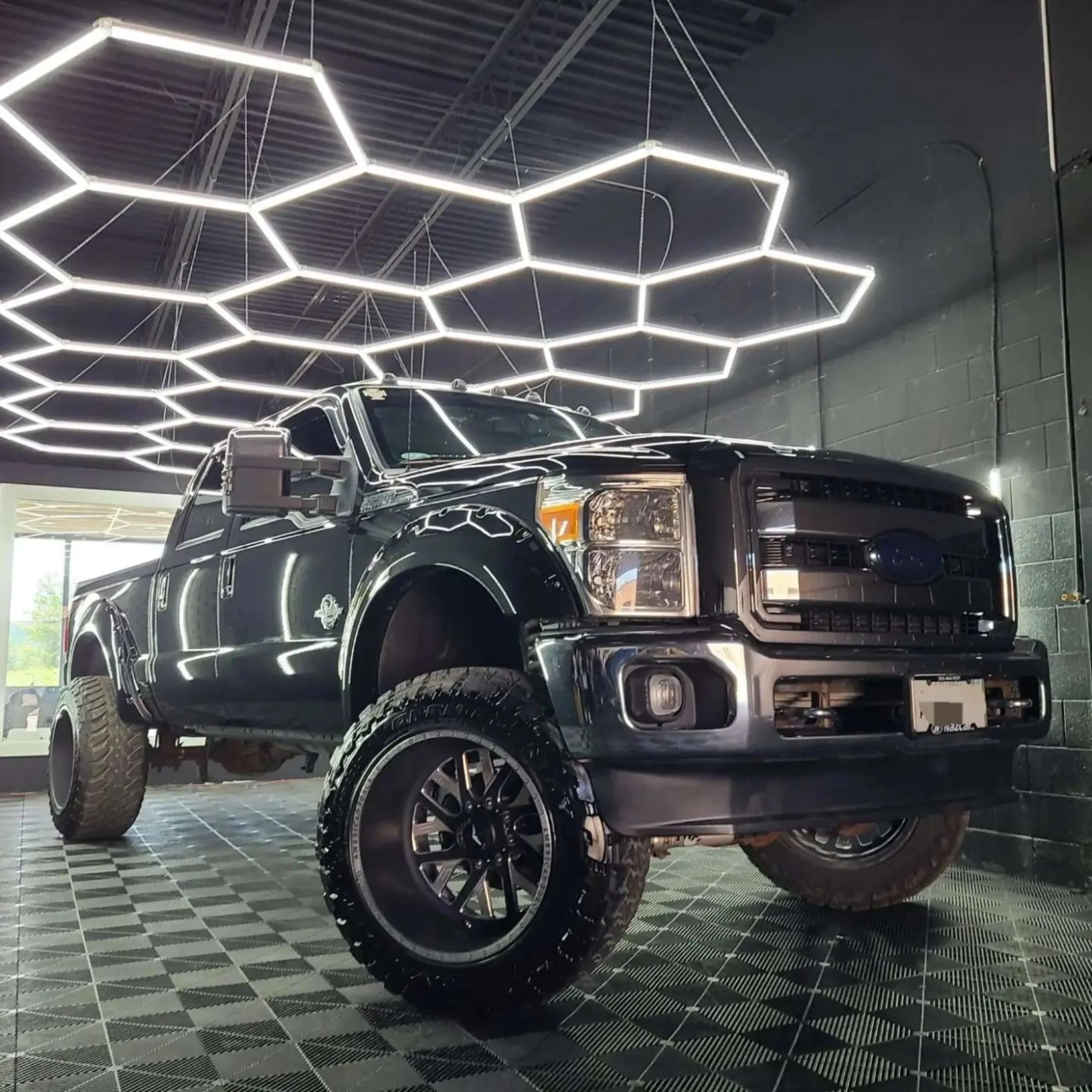 Lifted black Ford Super Duty after studio protection in Bradford